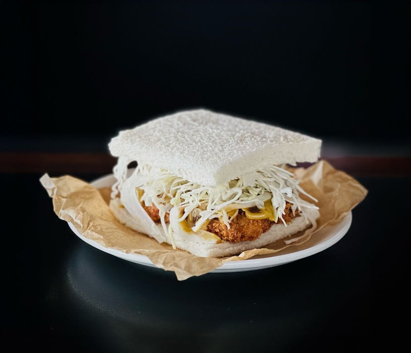 A white bread Katsu Sando on a plate.