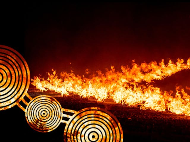 Flames cover the ground, while three circular shapes sit in the lower left corner of the frame.